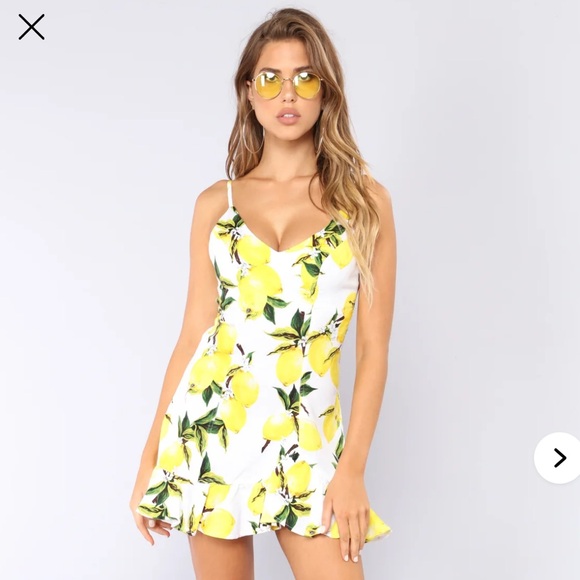 Luxxel Dresses & Skirts - LUXXEL-WHITE LEMON SHORT DRESS WITH RUFFLES size L